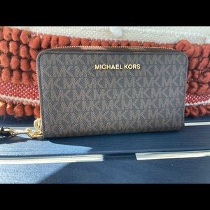 Michael Kors signature logo zippy wallet